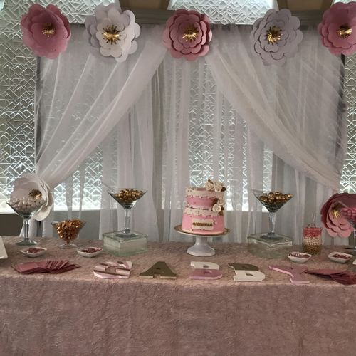 Paper flower candy table set up