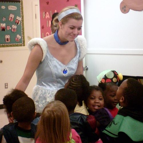 Cinderella Sings and dances with the children.