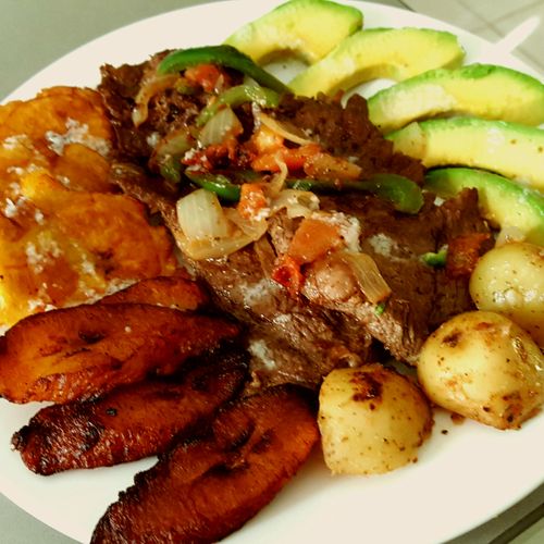 Steak and Onions with tostones and maduros with ga