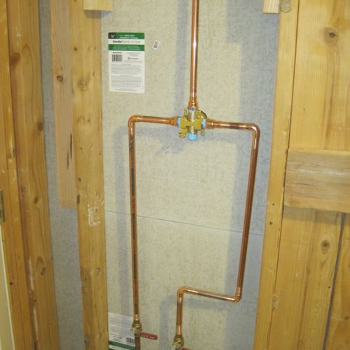 New plumbing with individual shut-offs for shower 