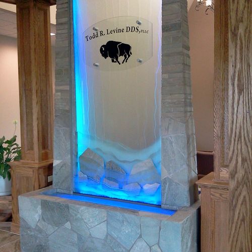 10' Etched glass and stone sculpture with LED ligh