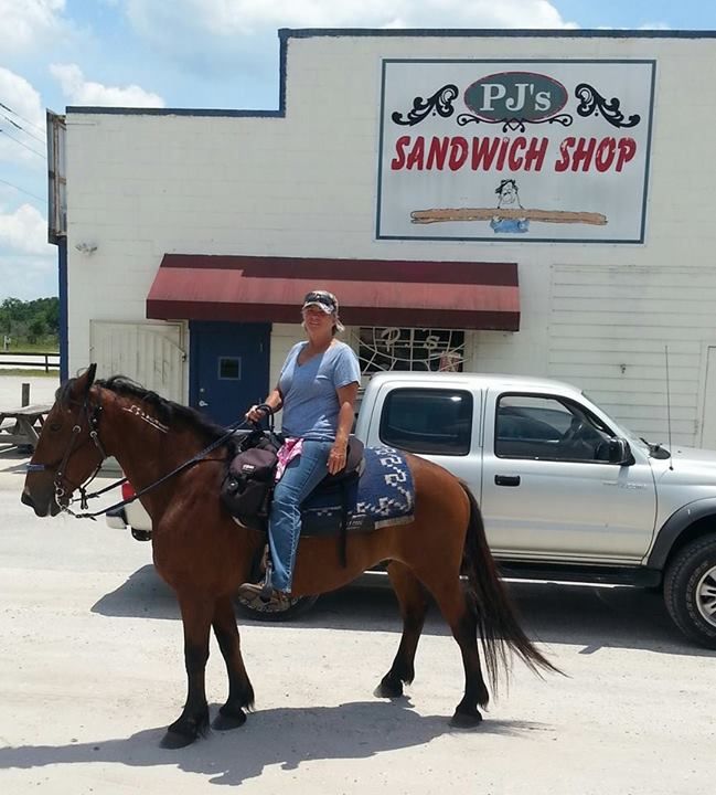 Owner of Wolfe's Born To Ride LLC, Kathy and Tank 