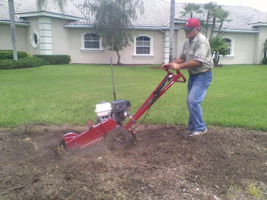 Grinding a stump before installation in Cheval