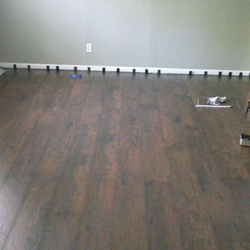 During laminate wood flooring installation with ex