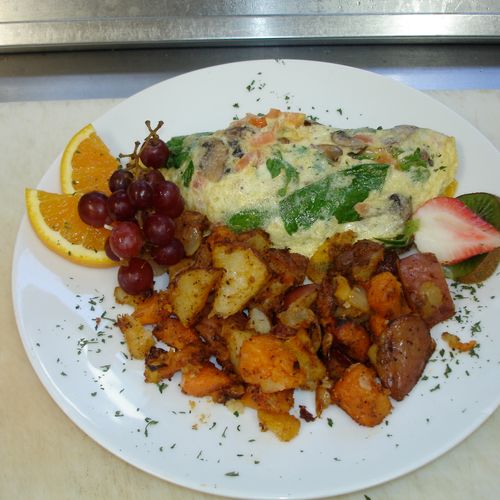Gourmet Omelets, home fries and fruit garnish