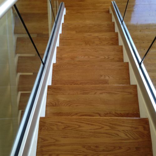 Solid stair threads refinished.