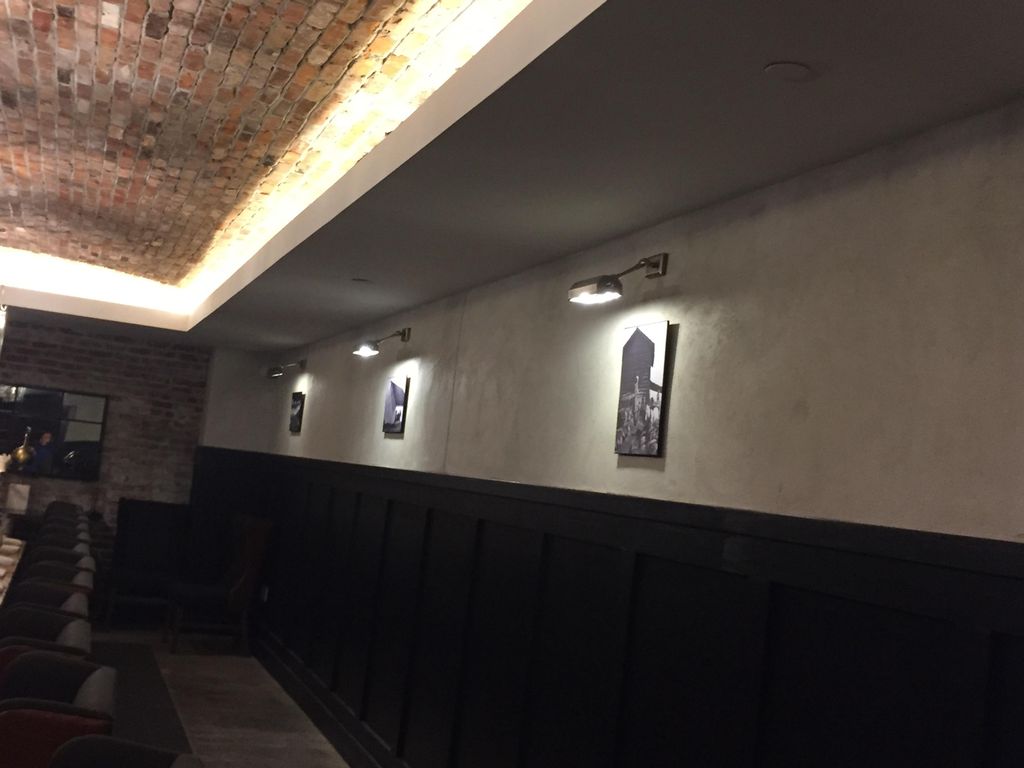 Commercial building added sconces through out the 