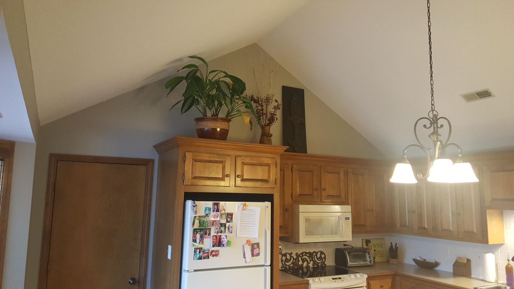 Beautiful kitchen paint job we did. They went from