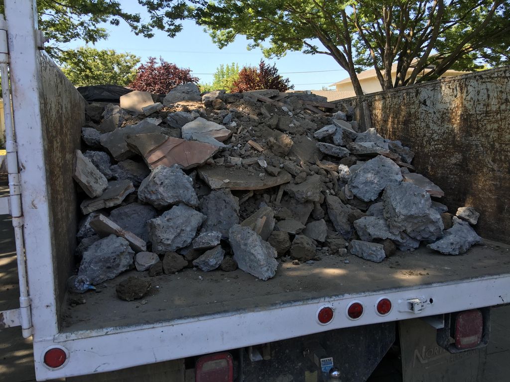 New foundation trenching and flagstone/concrete re