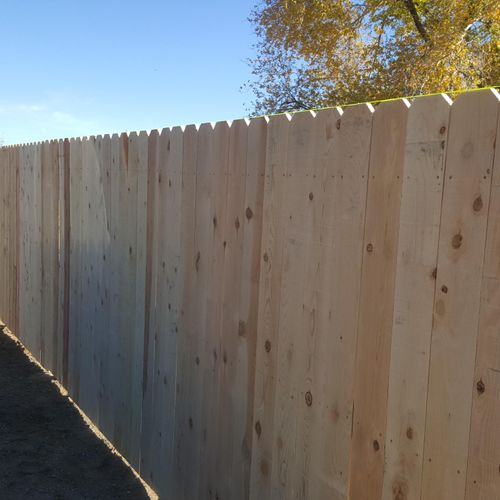 Custom built fence with steel post and primered sc