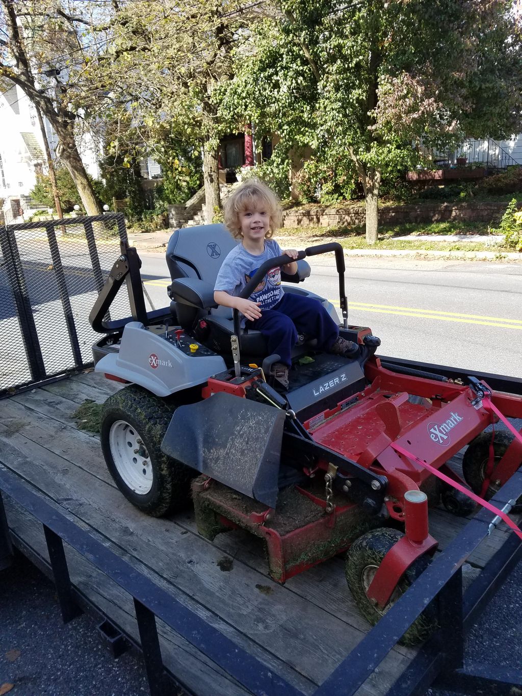 My young son checking out the new mower.