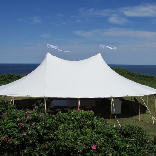 sailcloth wedding tent on the water