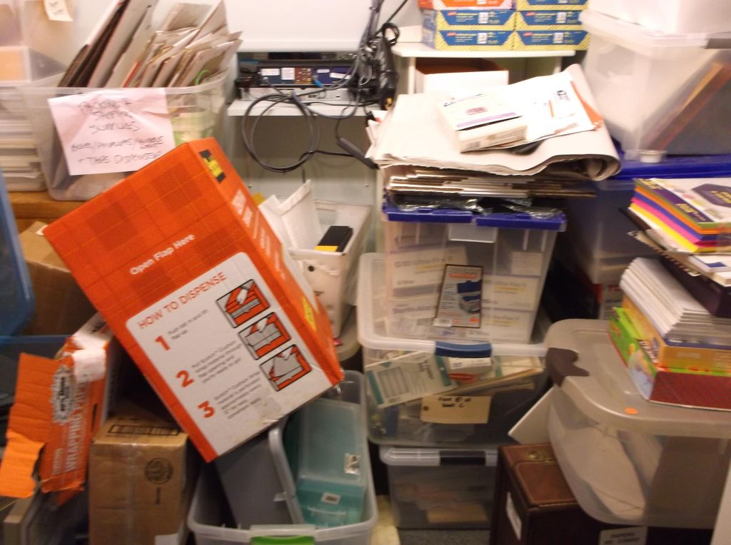Stationery cupboard before organizing