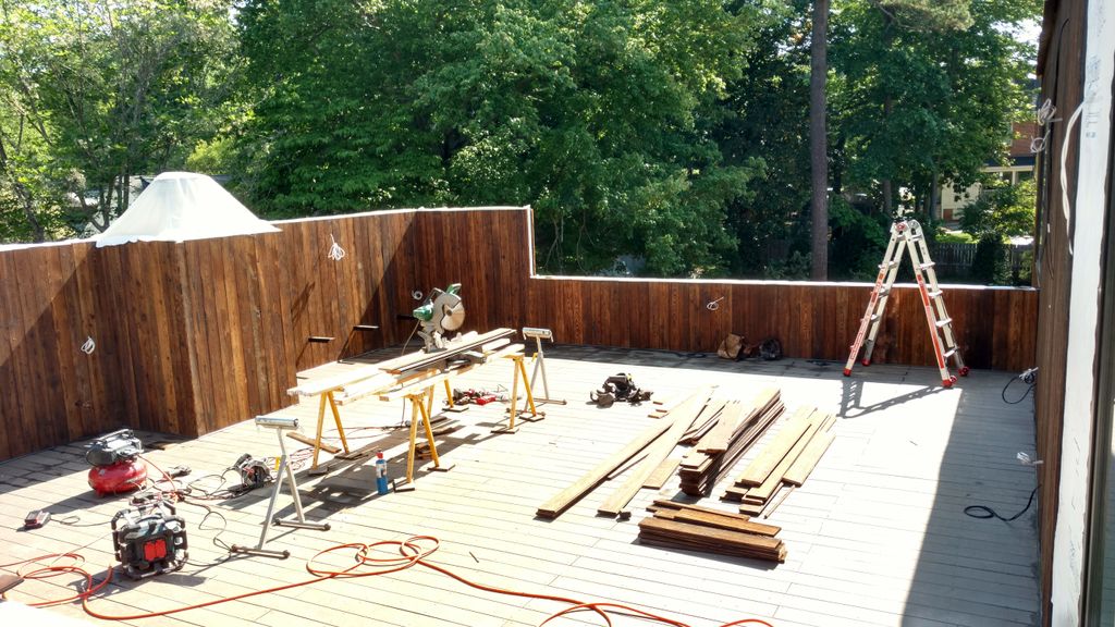 Charred siding w/ composite deck.