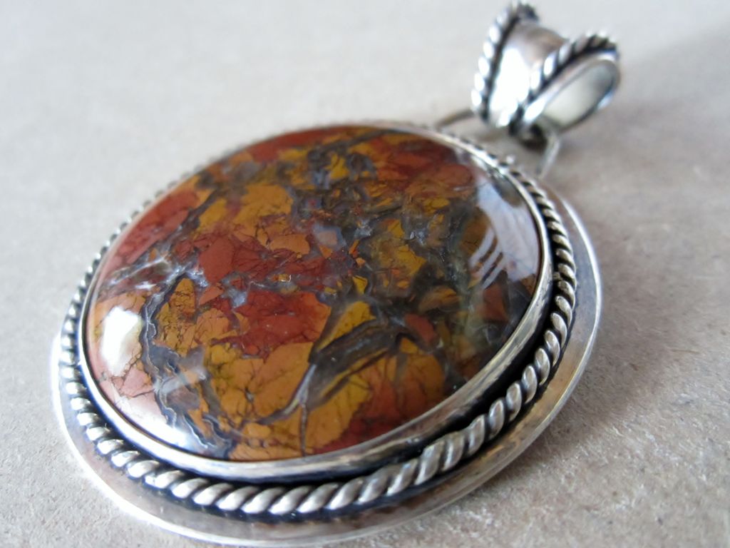 Custom pendant made for a family friend.  Sterling