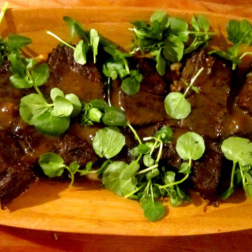 Braised Shortribs with Watercress and Demi Glace.