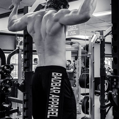 showing off his back muscles!