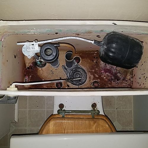 Inside toilet water tank deterioration.