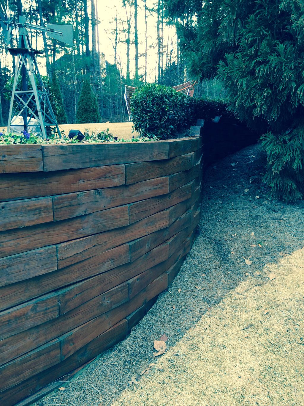 Retaining Wall Pressure Washed Painted Stain By QF