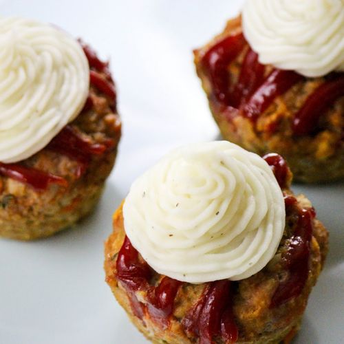 Individual turkey meatloaf cups topped to mashed p