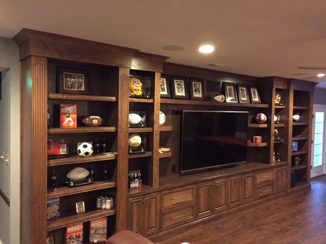 This is a large 22 foot wall unit and display cabi