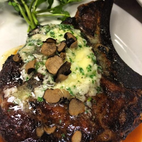 Dry aged Delmonico, Herbed Butter, and Truffles
