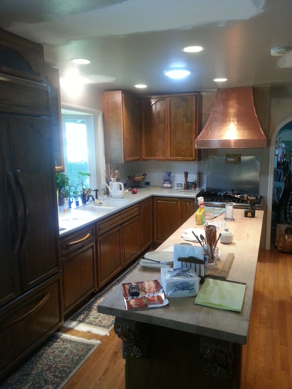 Custom birch doors and copper hood, along with cus