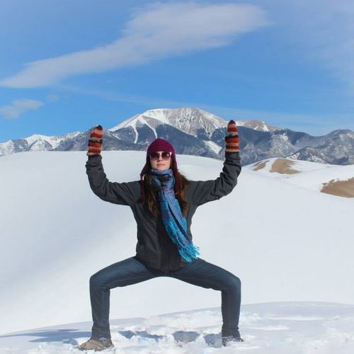 Goddess pose on the snowy Sand Dunes, CO