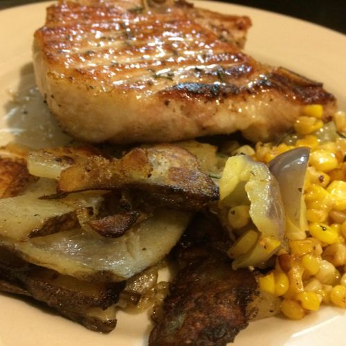 Bone-in Pork Chop with Red Potato Hash and Corn