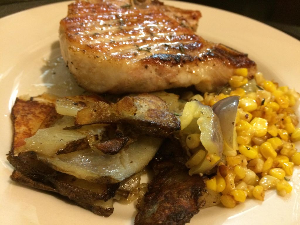 Bone-in Pork Chop with Red Potato Hash and Corn