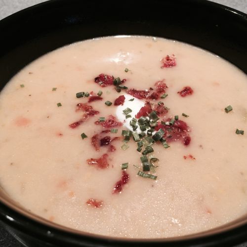 Creamy potato soup with bacon and chives