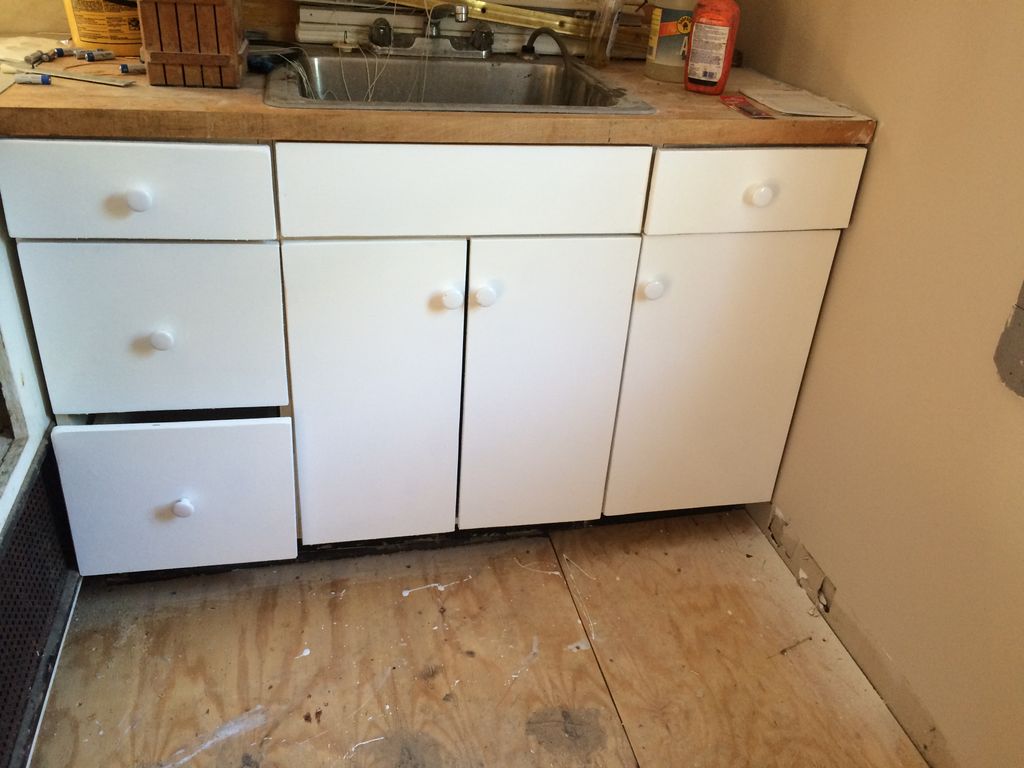 hand made new cabinet facings and painted