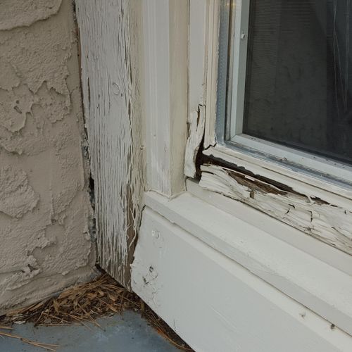 Wood rot on exterior window frame.