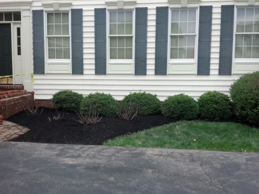 We offer mulching and flower bed cleanup