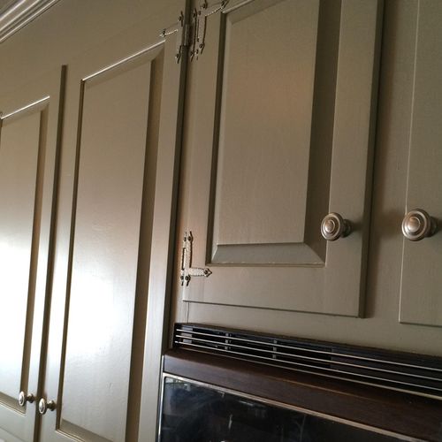 Update your stained wood cabinets for a more moder