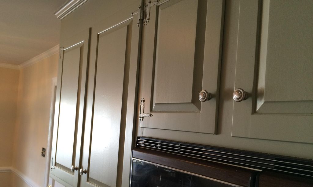 Update your stained wood cabinets for a more moder