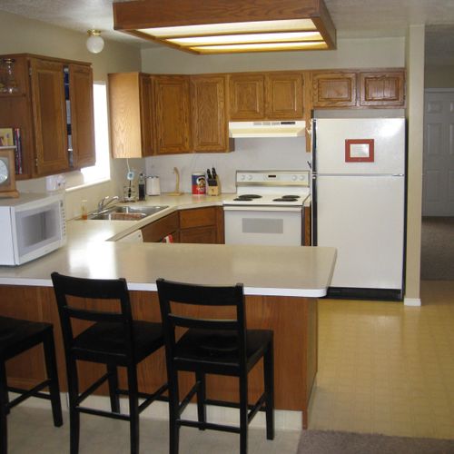 Photo of original kitchen before improvements.