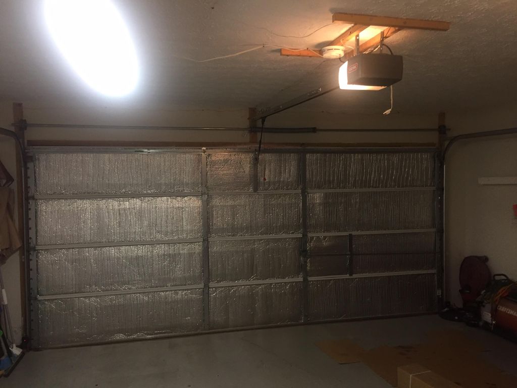 B1. Before, non insulated steel door.