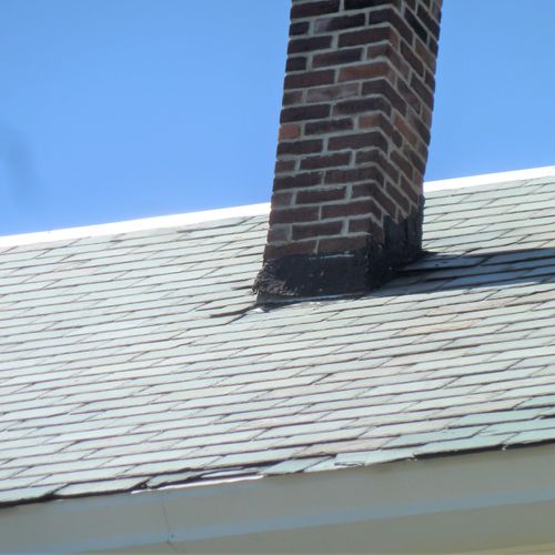 Damaged & loose slate roof shingles