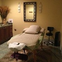 Inviting, relaxing massage room.