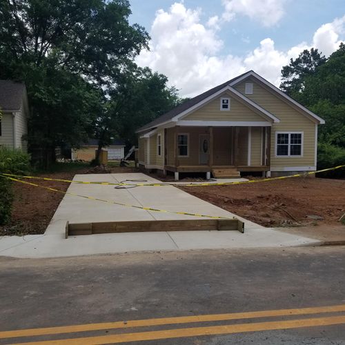 New Home Construction Siding and Driveway