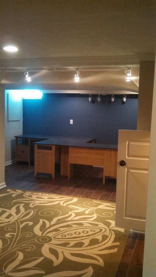 Basement remodeled into a leasing office.