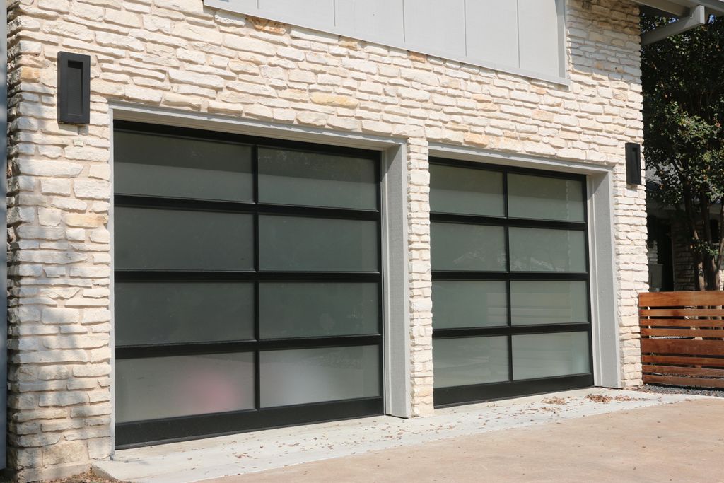 8x7 Raynor Full View doors powder coated in black 