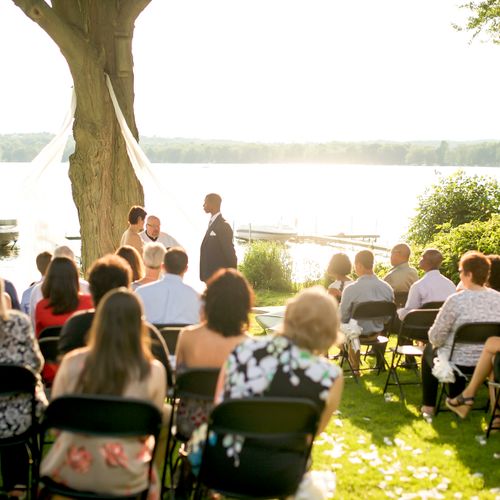 Lakeside afternoon ceremony Image by Deb & Matt Ph