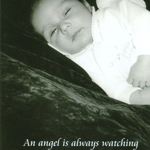 2001 - Angel Watching - unaltered photograph w/ te