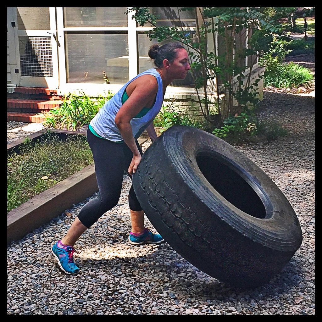 Bootcamp Athlete Flipping Tires