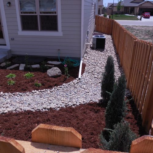 Cedar privacy fence and back yard landscape instal