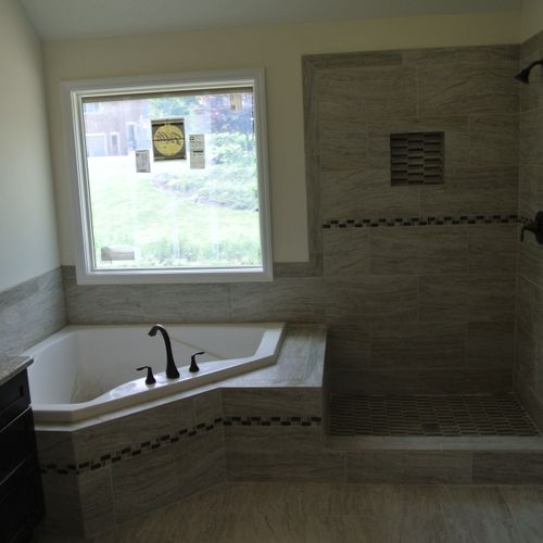 Custom shower with whirlpool tub