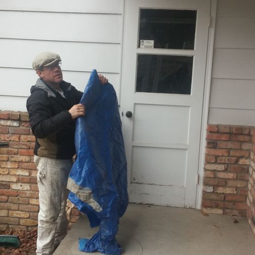 Dave doing some prep on winter exterior paint job.