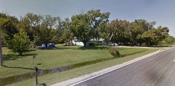 Before Photo of same house in next photo that is n